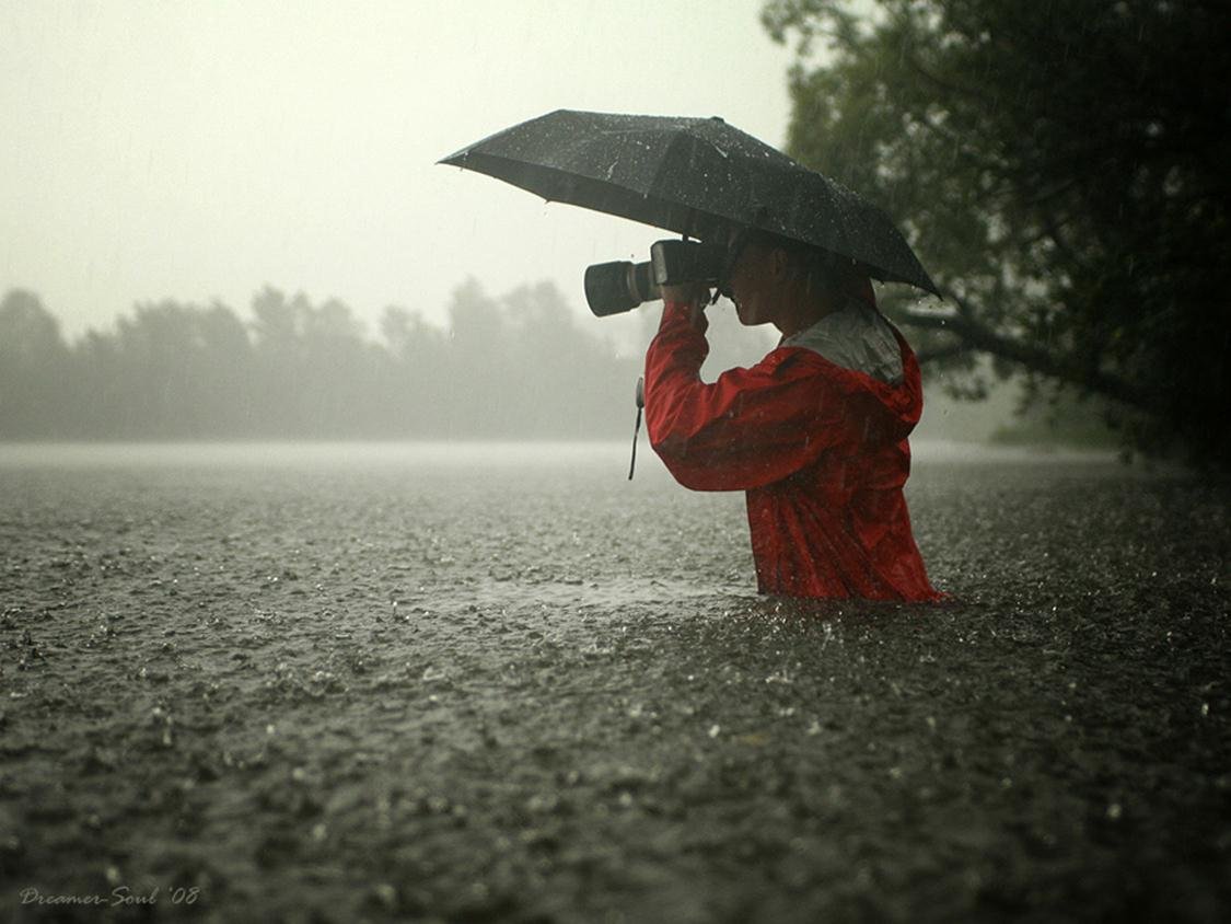 Фотограф под дождем