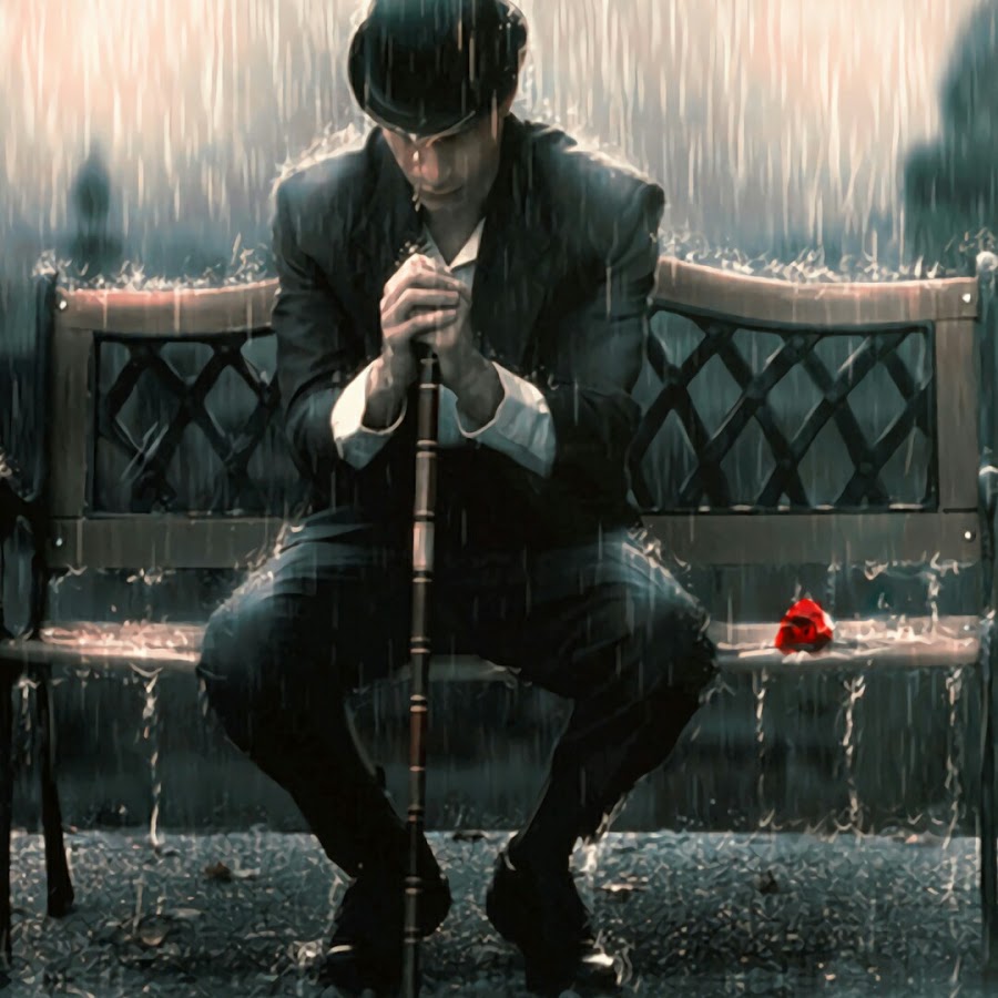 Одинокий человек под дождем