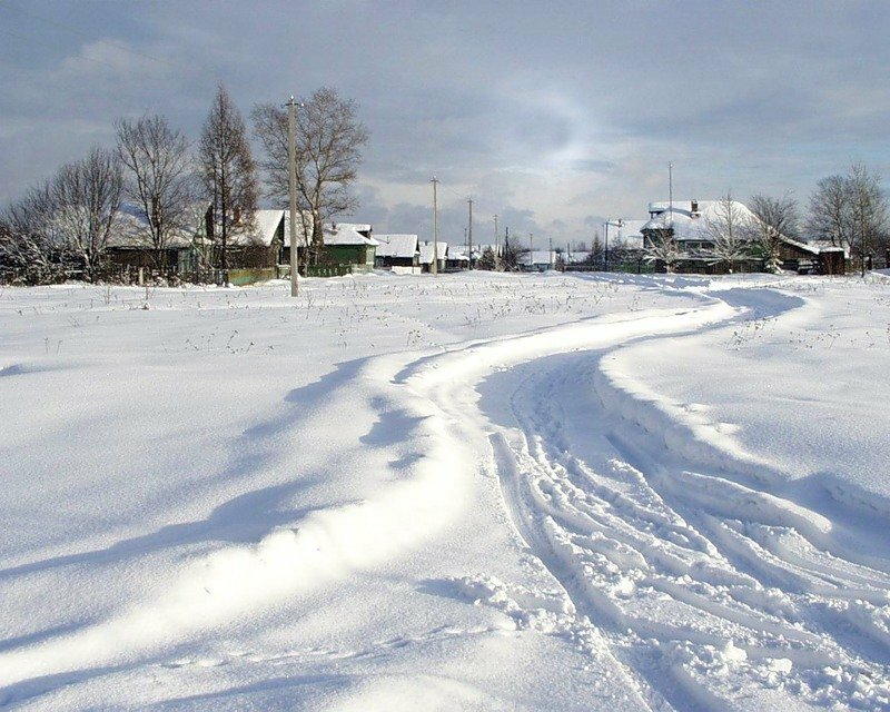 Деревня в снегу фото