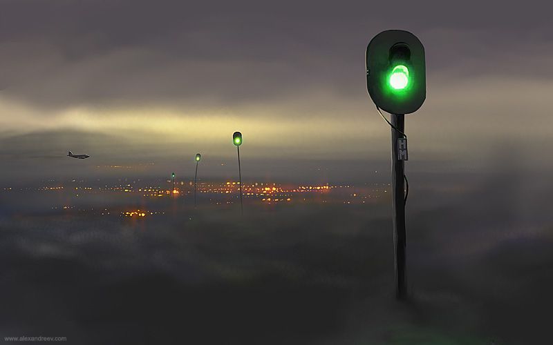 В потёмках улицы у светофорного столба